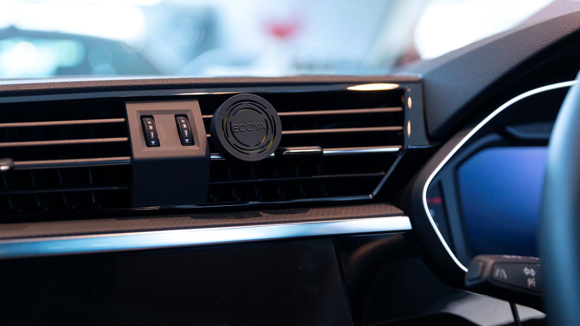 Ecoya car diffuser clipped on to the car air vent